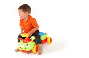 Small Boy Riding On Car